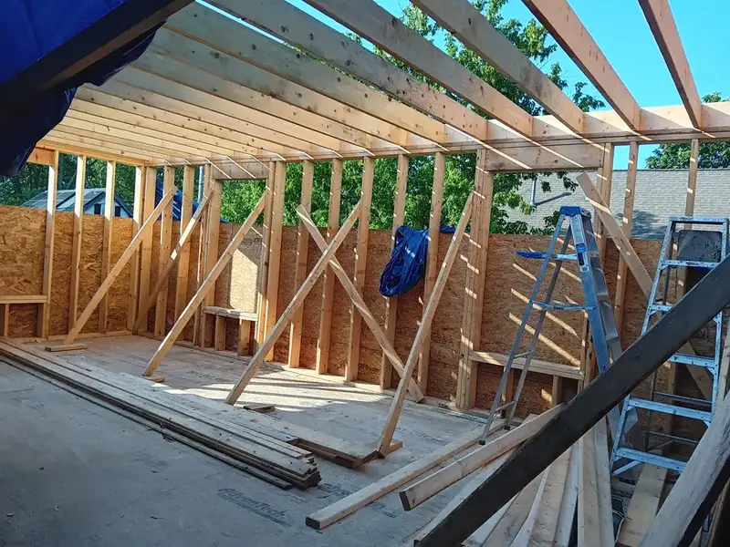 New wood framing with rafters and ladders